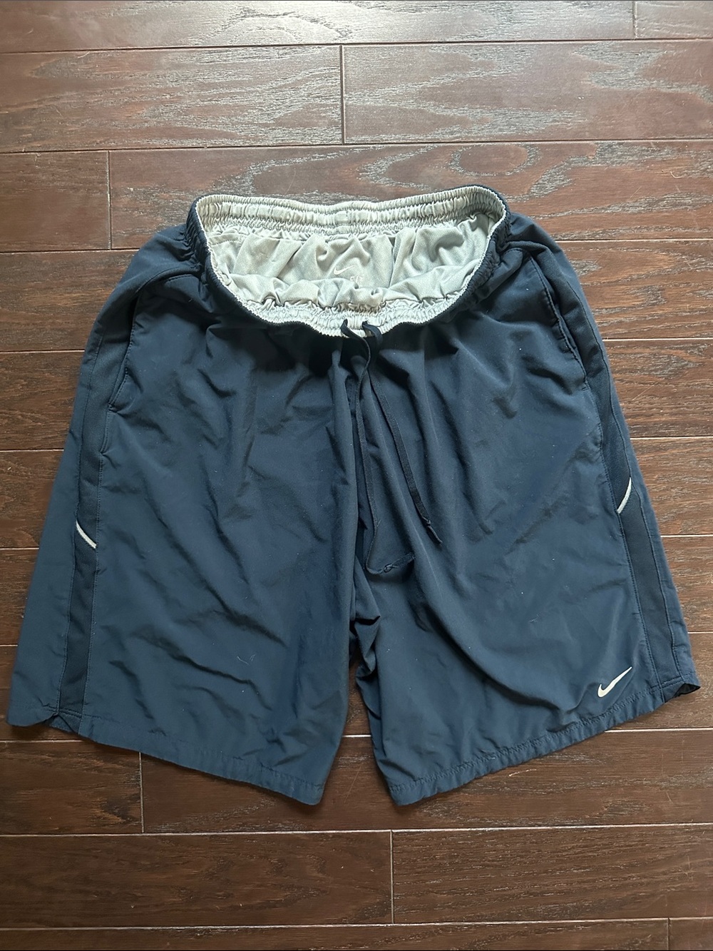 Nike Men's Dark Blue Athletic Shorts with White Accents